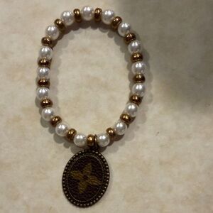 Elegant Gold and Silver Beaded Bracelet
